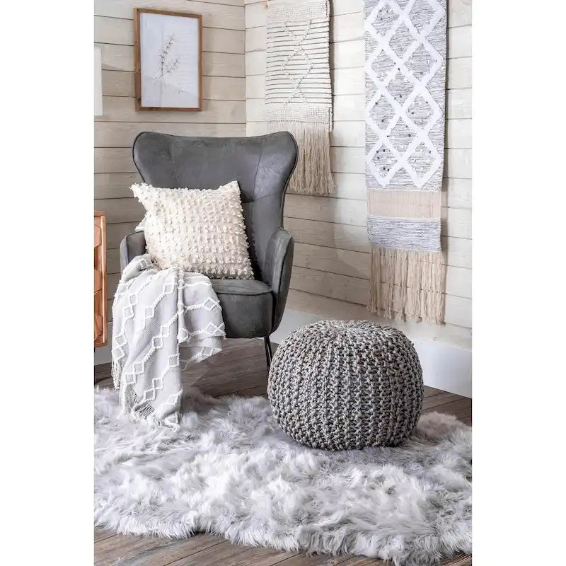 Klassischer gestrickter Pouf aus massivem Jute-Ottomane
