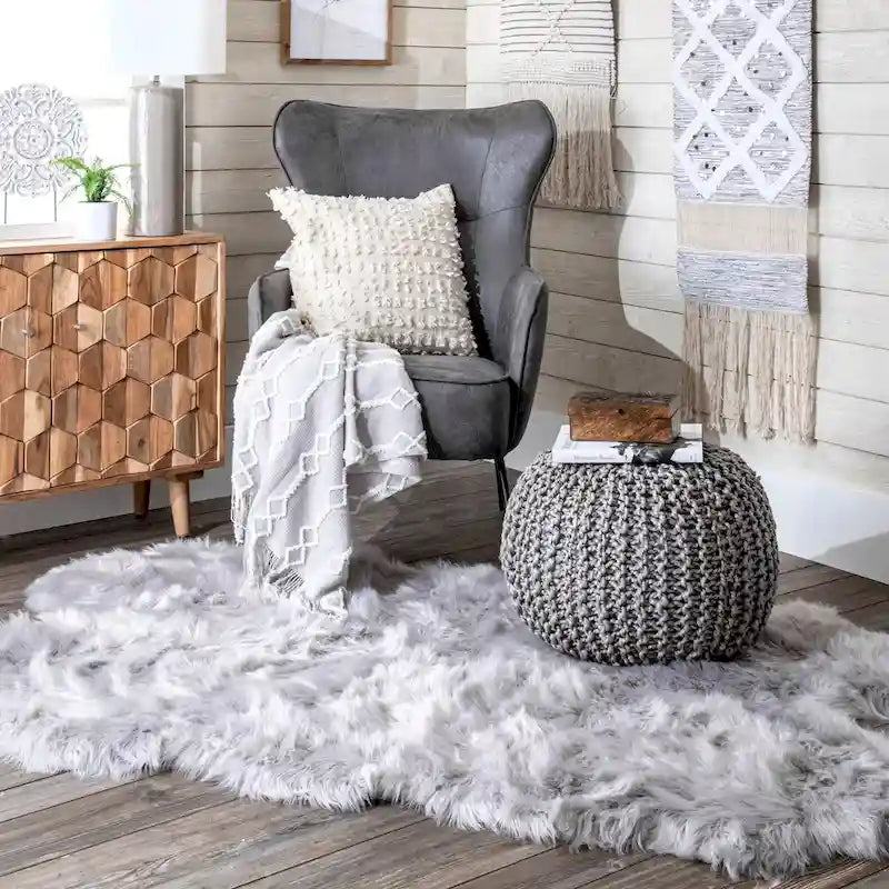Klassischer gestrickter Pouf aus massivem Jute-Ottomane